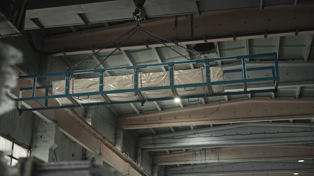 Heavy Steel Elements Are Lifted And Positioned With Safety Measures And Precise Control By Operator