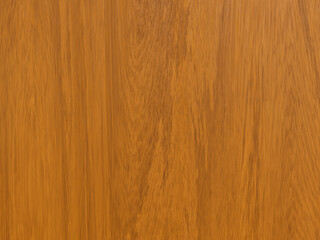 Obraz premium Smooth oak wood background with light brown grain details.