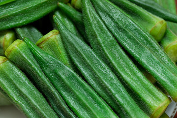 Fototapeta premium Blanched okra, fresh green vegetable with tender texture after boiling, natural appearance and vibrant color