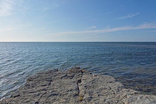 Scenic coastal landscape at Undva Pank, (Undva cliff) in summer with clouds in the sky, Saaremaa, Estonia, Europe.