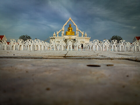 Lopburi, Thailand, April 12, 2025, Puttha Sathan Lopburi Sri Suvarnabhumi - Low angle night view of temple plaza in Lopburi