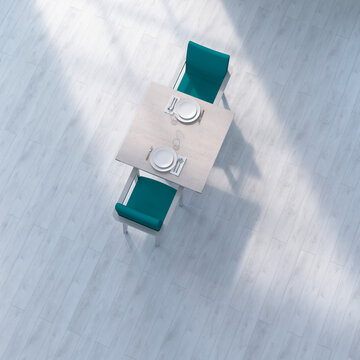 Directly above view of an empty dining table set for two