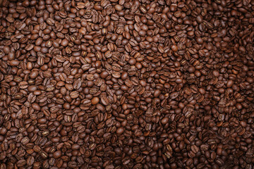 Obraz premium Top-Down Full Frame Texture of Freshly Roasted Aromatic Coffee Beans