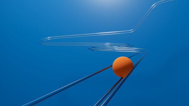 Orange ball rolling on chrome rails like a pinball machine