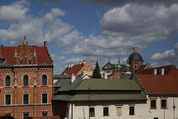 Obraz premium Elegant Historic Rooftops and Facades in the Old Town of Kraków