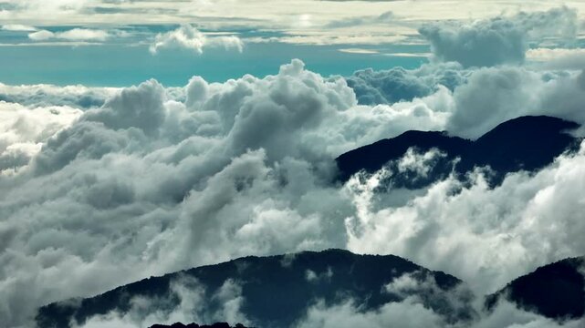 Aerial view misty foggy mountain landscape with clouds