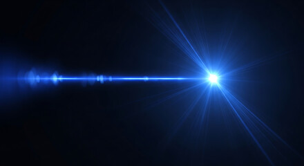Fototapeta premium Abstract bright blue lens flare with optical starburst and light rays on black background