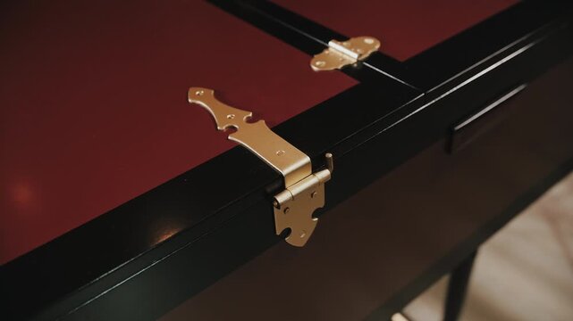 Cinematic Wooden Surface Detail with Metal Latch and Elegant Design Background