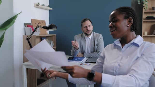 Angry manager scolding employee for bad work performance