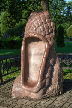 VYAZMA, RUSSIA - JULY 14, 2024: Sculpture "Russian lapot" (symbol of folk traditions). Vyazma, Smolensk region (vertical)