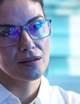 Engineer with microchip reflection in eyewear designing technology
