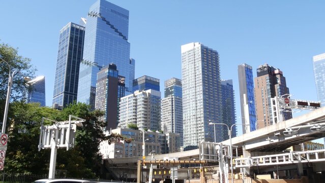 New York City Manhattan Midtown, United States of America. Hudson Yards skyscraper towers. New modern contemporary architecture, glass buildings in Hells Kitchen. Port Authority road highway junction.