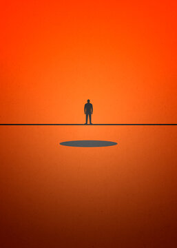 Silhouette of man alone by a hole on orange background illustration