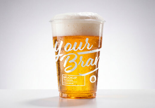 Beer in plastic cup with foam isolated