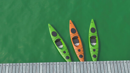 Top down view of kayak moored at wooden dock on green water