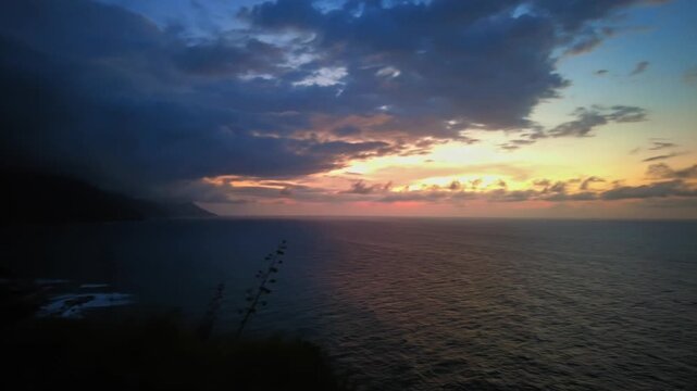 Panoramic aerial view of Choroni Bay with its mountains at sunset, with clouds, Aragua, Venezuela