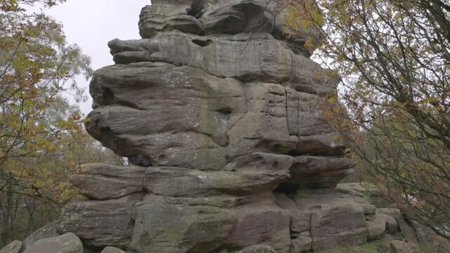 revealing shot of a massive rock formation revealing erosion at Brimham rocks