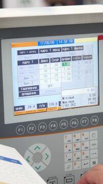 Energy security - system management panel. Man worker manipulates for Industrial remote control
