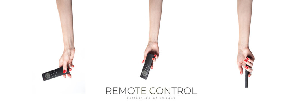 Hand holding audio and television remote control isolated on white background. Cliping Path.