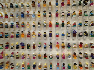 Naklejka premium April 2026, Singapore: LEGO minifigures displayed in a wall