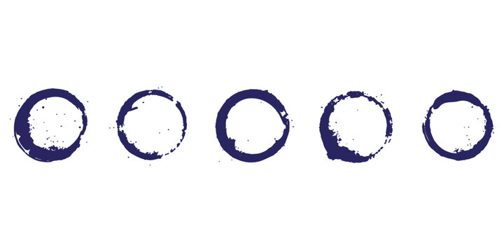 Set of five dark blue ink circle stamps with textured rough edges