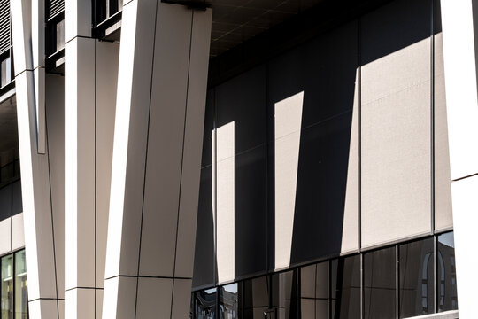 Modern architecture abstract facade where column shadow and geometry line shape a minimalism study of structural proportion and detail
