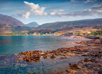 Attractive summer cityscape of Neo Itilo resort. Impressive seascape of Ionian sea. Superb morning scene of Peloponnese peninsula, Greece, Europe. Vacation concept background. © Andrew Mayovskyy