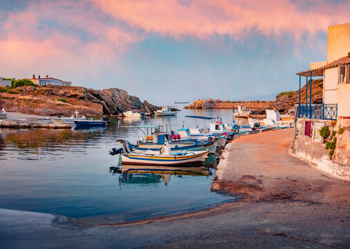 Calm summer cityscape of Vathi port. Amazing morning scene of Peloponnese peninsula, Greece, Europe. Wonderful seascape of Mediterranean sea. Traveling concept background.