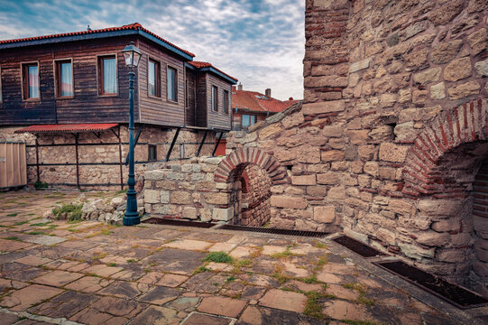 Splendid summer cityscape of Old Town of Nessebar. Empty street of old rerort in Bulgaria, Europe. Traveling concept background.