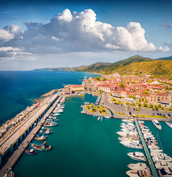 Aerial summer view from flying drone of Acciaroli port. Spectacular morning scene of Mediterraneanm coast of Italy. Traveling concept background.