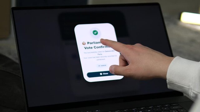 Digital democracy in action: user confirming a parliamentary vote on a laptop. High-impact footage for political campaigns, election news, and digital government services. Showcase secure online