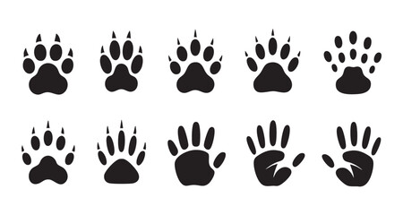 Paw print vector icon set bear, cat, dog pawprint and hand print isolated on white background © MdNasir