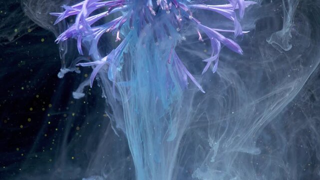 Filament purple bloom submerged in swirling blue ink, imaginative studio portrait for visual effects artist, elongated petals flowing like ribbons,