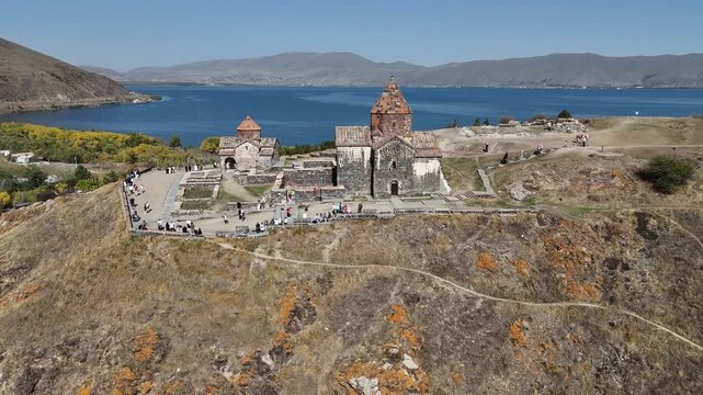 Sevanavank Monastery with Lake Sevan Shoreline and Hills