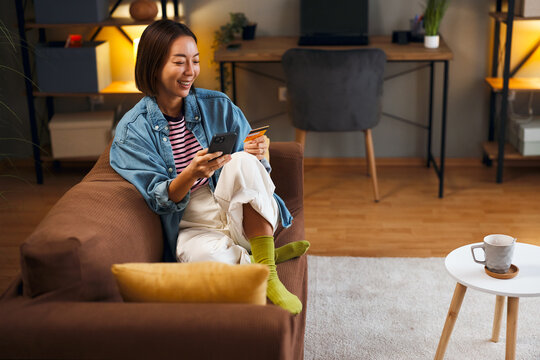 Mobile payment and online purchase from home sofa