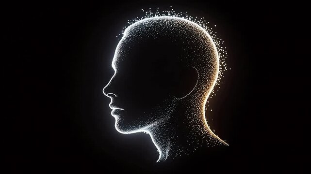 Human head silhouette with glowing particles