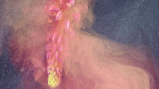 Tall lupine drifting through pink haze with glittering particle field, cinematic macro perspective capturing petal clusters and nebulous pigment