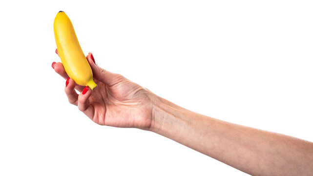 Baby banana or small banana in hands isolated on white background. Small bananas.