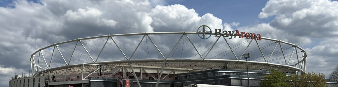 Leverkusen, Germany - April 18, 2026: Sign of BayArena stadium with roof and upper level exterior view on Bundesliga game day