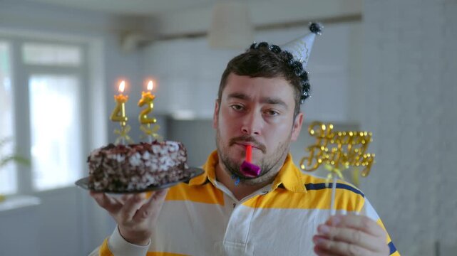 Medium Shot One Unhappy Man Holding Number Cake Blowing Horn