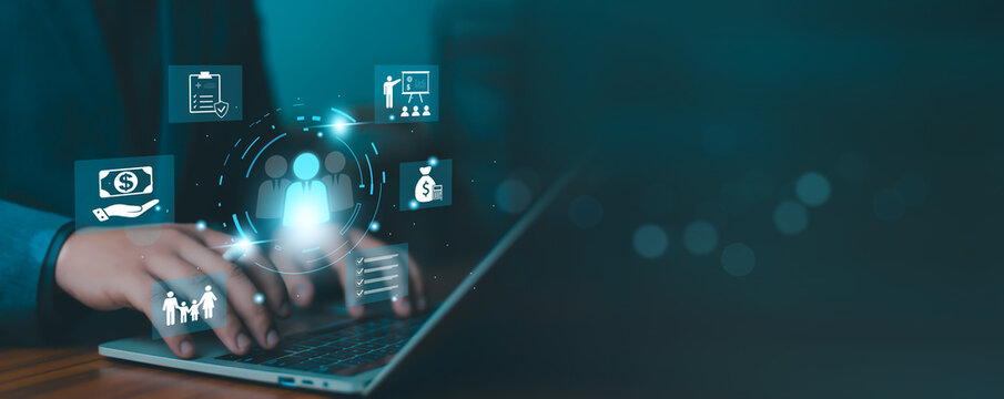 Human resources management and employee benefits concept with digital interface icons showing payroll, insurance, training, and workforce planning on laptop. Modern HR system and corporate strategy.
