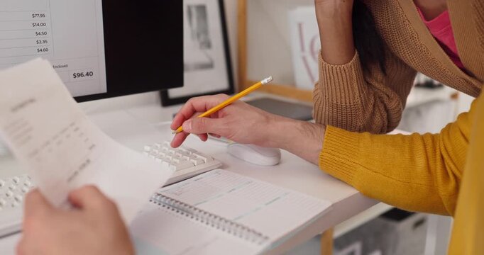 Couple tracking bill and budget at home. Closeup of hands at a computer with paper receipt to track finance, list expenses, and planning payment. Clear concept of household finance today.
