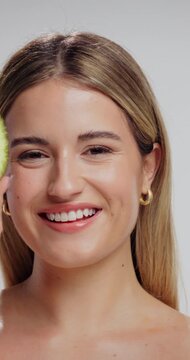 Avocado, beauty and face of woman in studio for natural, organic or hydration routine. Portrait, glow and female person with fruit for facial dermatology treatment for health by white background.