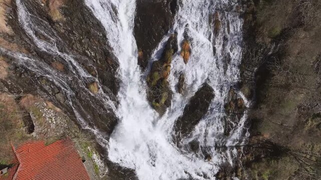 Waterfall Of The Furelos River In Toques Near Melide In The A Coru&ntilde;a Province Of Galicia, Spain. Aerial Tracking Shot