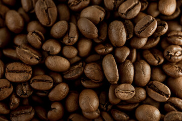 Fototapeta premium Close-up of roasted coffee beans with rich aroma, showcasing espresso and caffeine concept, highlighting texture, freshness, energy, and modern café lifestyle. 