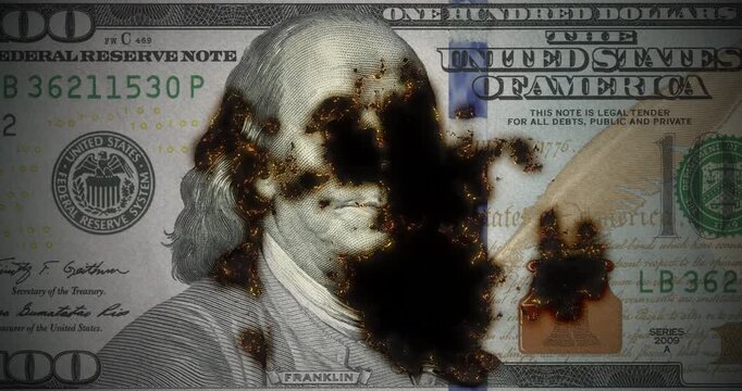 100-dollar bill with smoldering and slowly burning, a hundred-dollar bill, new usa banknote turning to ash with glowing embers, loop footage