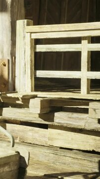 Soft sunlight touches the weathered wooden steps of a rustic structure. The tranquil setting invites relaxation and reflection in nature&rsquo;s serene embrace, creating a peaceful atmosphere.