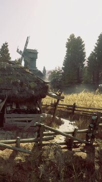 A serene countryside landscape unfolds with a charming thatched cottage nestled near a wooden fence.