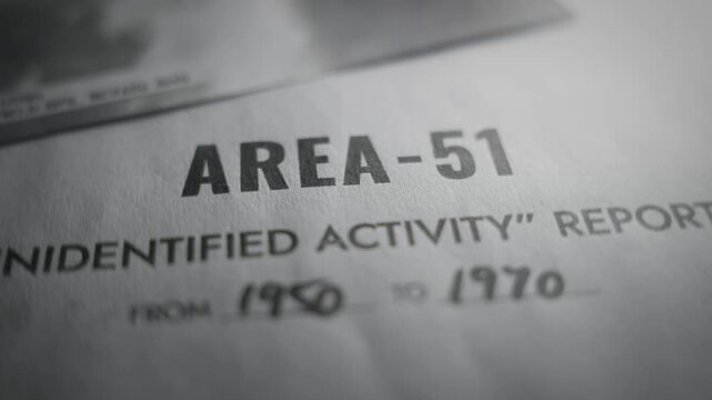 Camera spins over retro looking government Area 51 of UFO activity report file. Vintage document with classified top secret information and evidence proofs of alien activity and sightings by agency