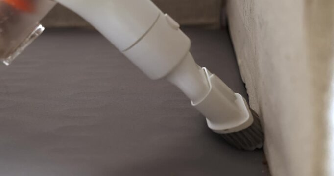Small vacuum attachment cleans dust from corners and tight spaces